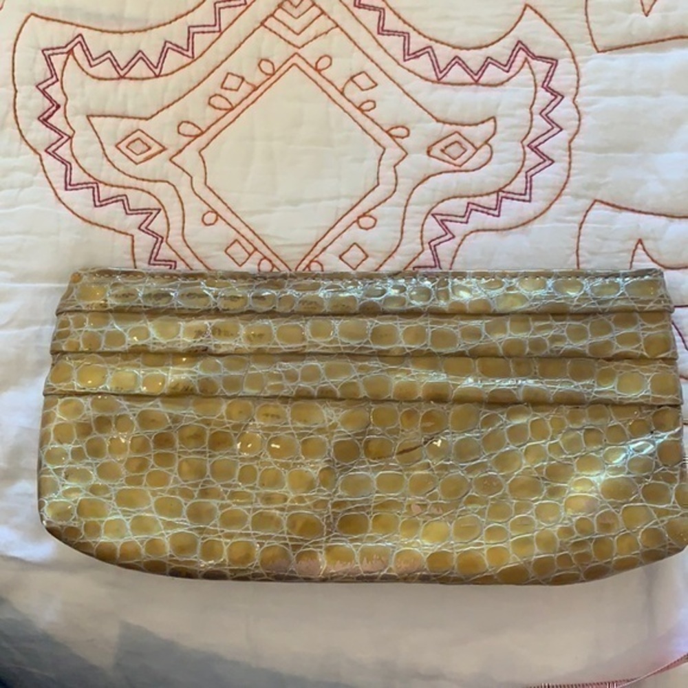 Neutral shiny Lauren Merkin clutch
